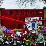 Memorials placed in front of the Chardon High School sign in the aftermath of the Feb. 27, 2012 shooting which claimed the lives of three students.