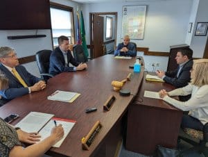 Amy Patterson/KMG During a special meeting May 5, Geauga County Commissioners officially authorized Prosecutor Jim Flaiz, second from right, to accept a settlement with the City of Chardon. As part of the agreement, the county’s historic courthouse on Chardon square will undergo a minimum of $15 million in renovations, to be completed by next December and paid for by the county.