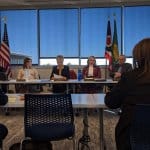 AMY PATTERSON/KMG Geauga Public Health board members Lynn Roman, left, and Carolyn Brakey read from statements regarding their presentation of a plan to join an agreement with the Lake County General Health District during a March 15 special meeting.