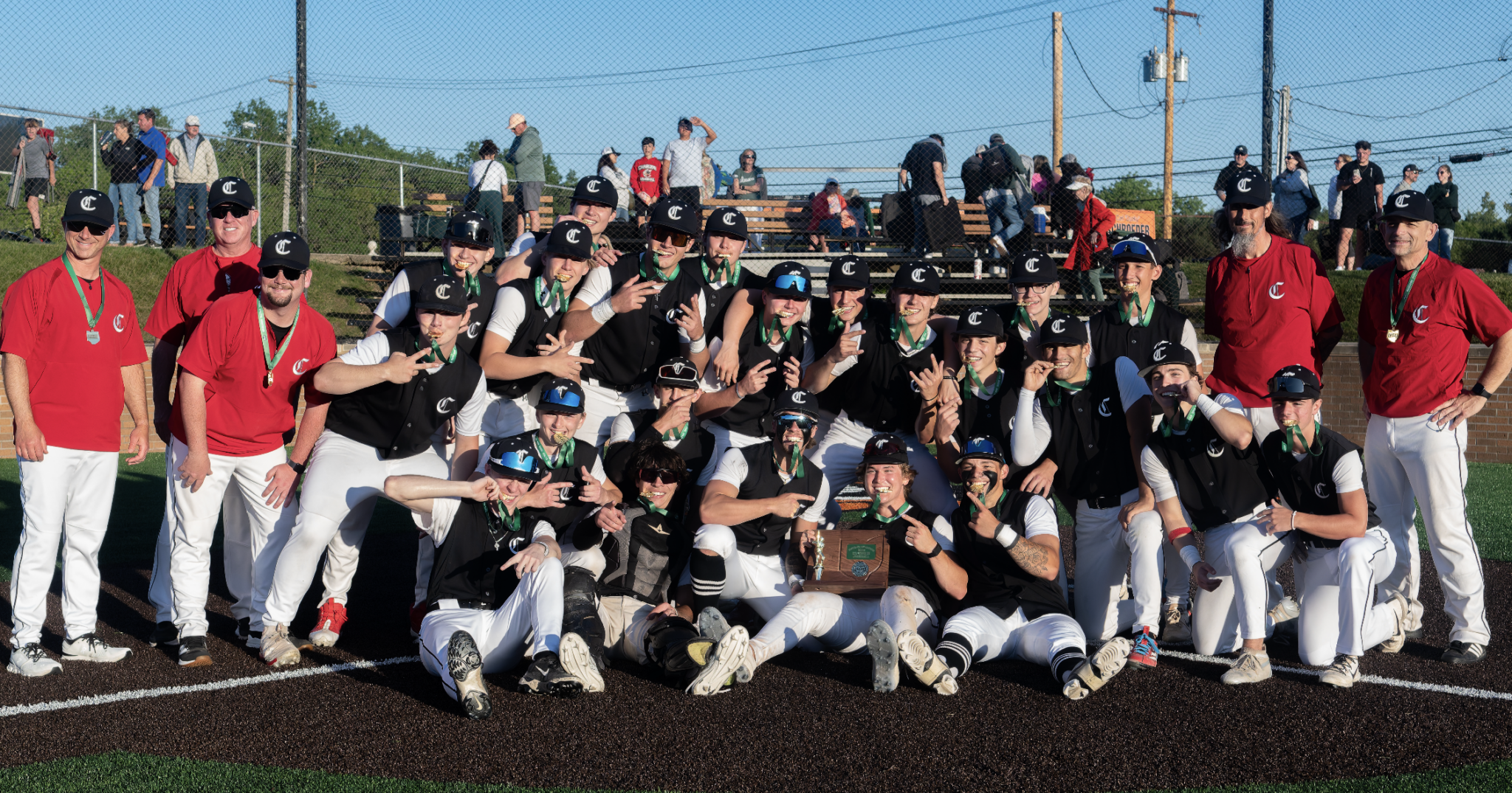 Hilltoppers Tally 4 in Ninth to Capture District Title Over Greenmen